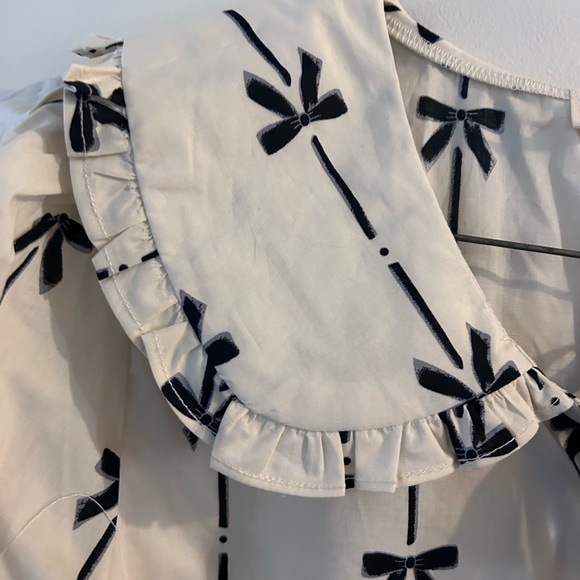 Ruffled Bow-Print Peplum Blouse in Ivory and Black - Picture 5 of 6